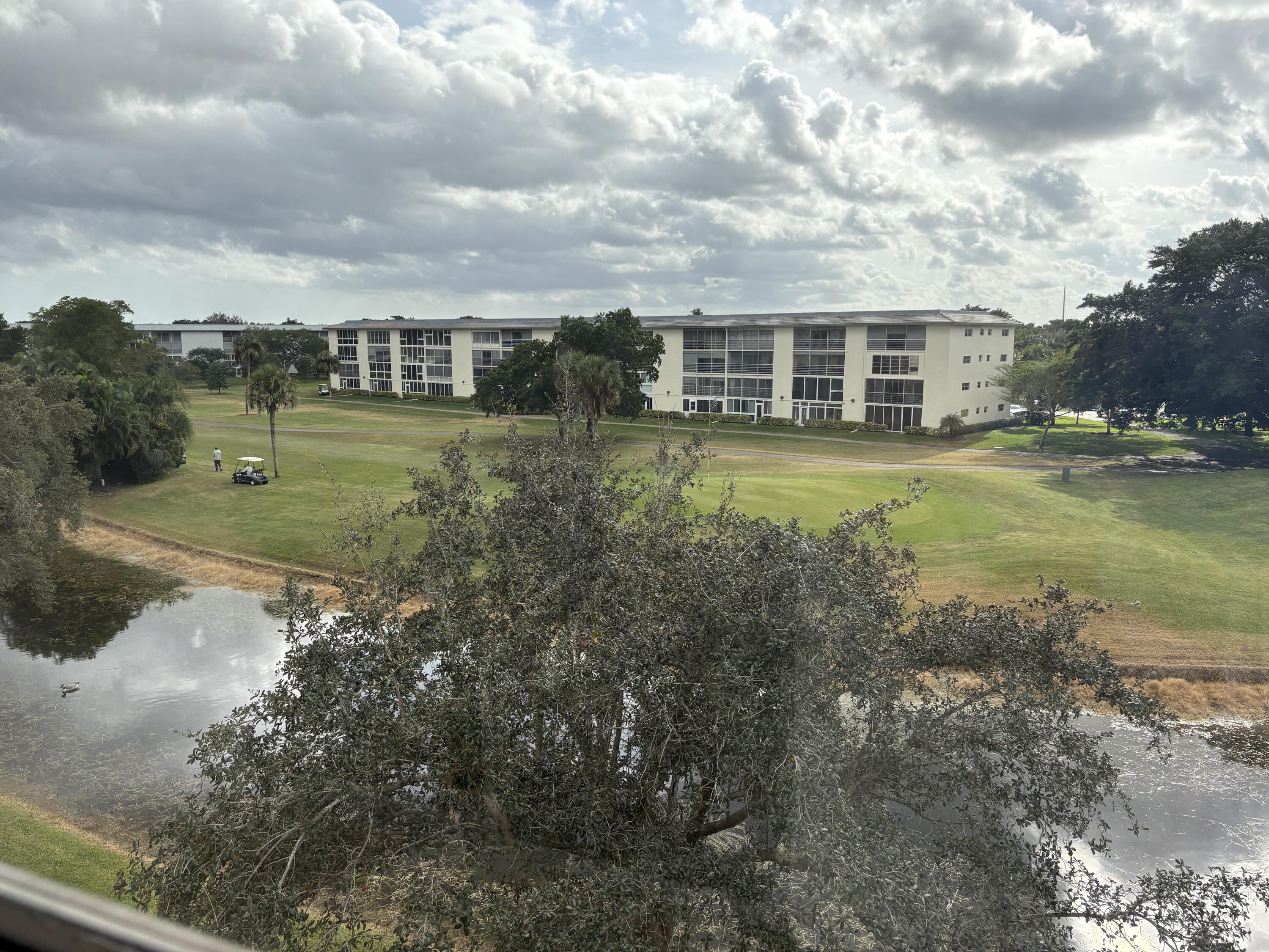 a view of a house with a big yard