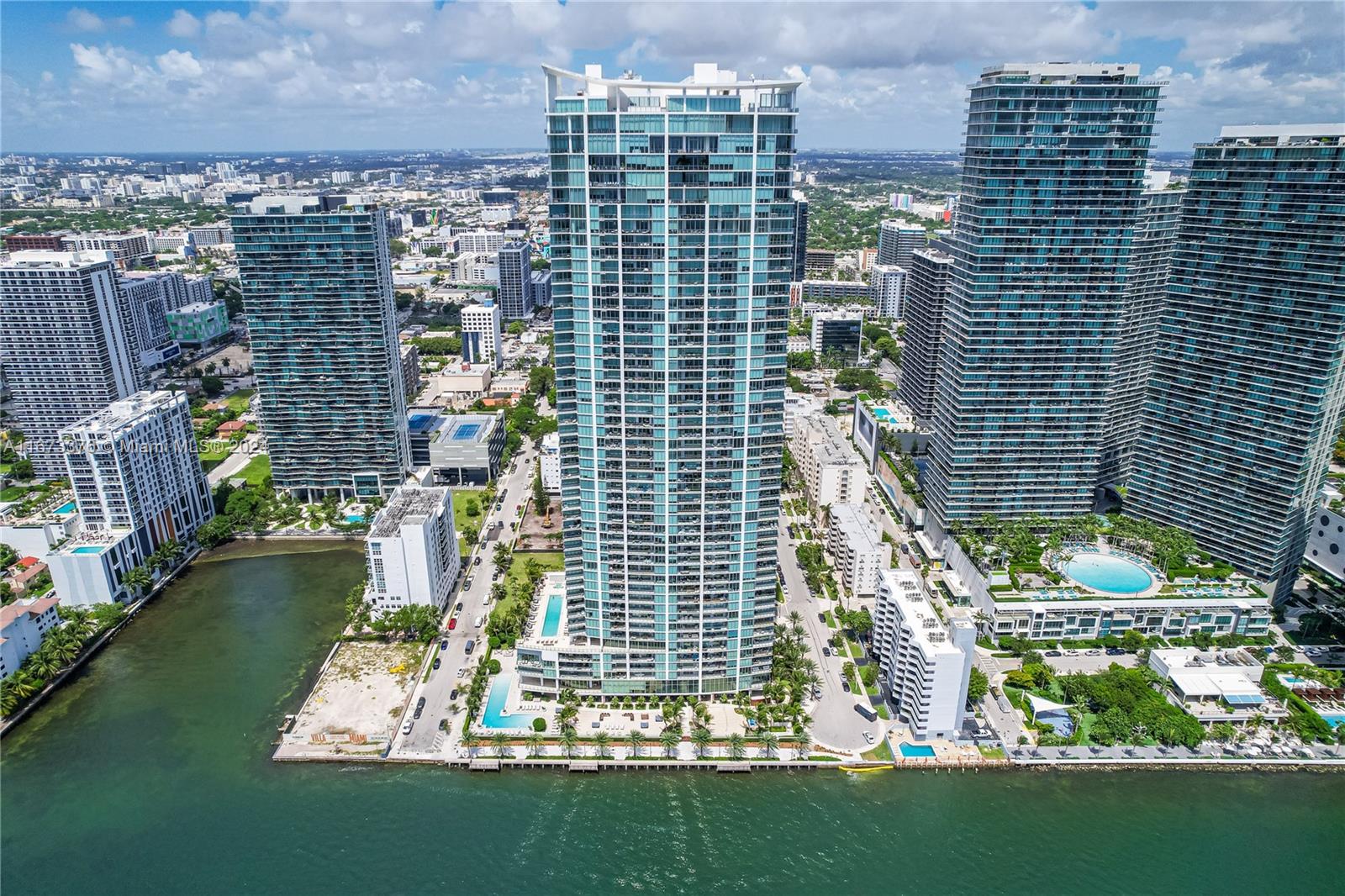 a view of a city with tall buildings