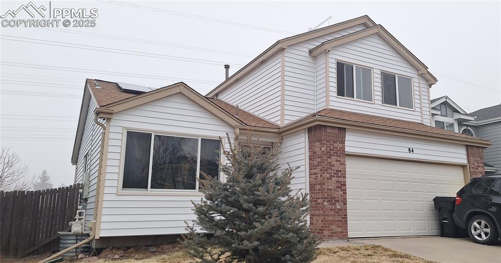 View of front of house featuring a garage