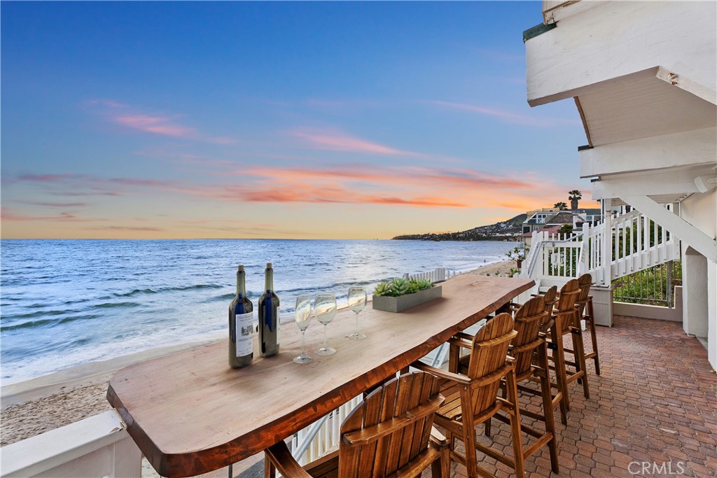 a view of a balcony with an ocean