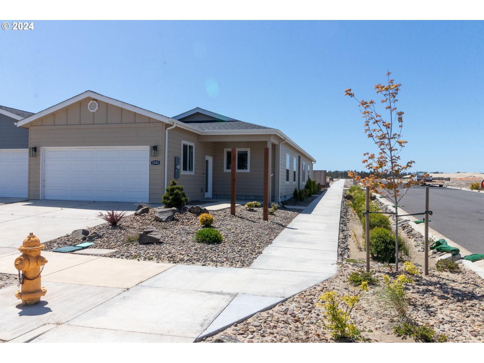 a front view of a house with entertaining space