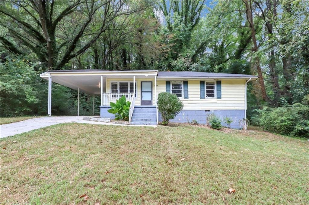 front view of a house with a yard