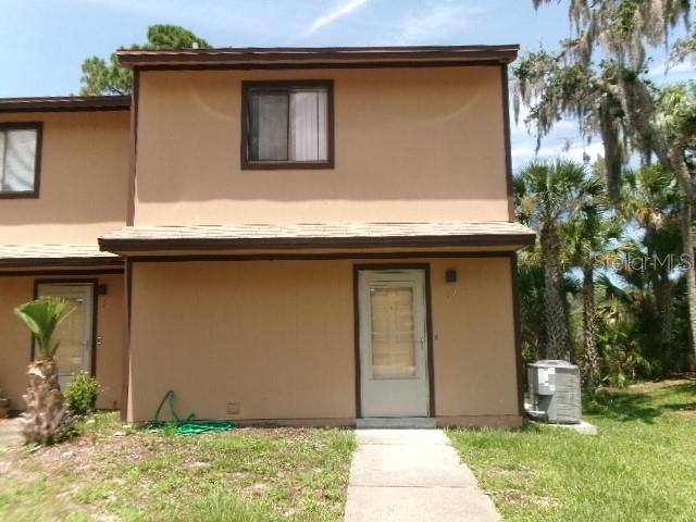 a front view of house with yard