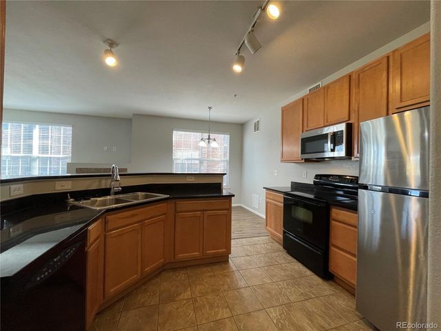 $1,995 | 17497 Nature Walk Trail, Unit 107 | Prairie Walk on Cherry Creek Condominiums