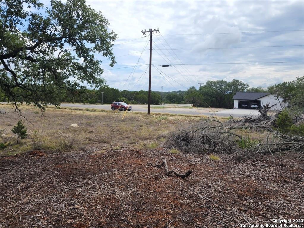 a view of a road with a yard