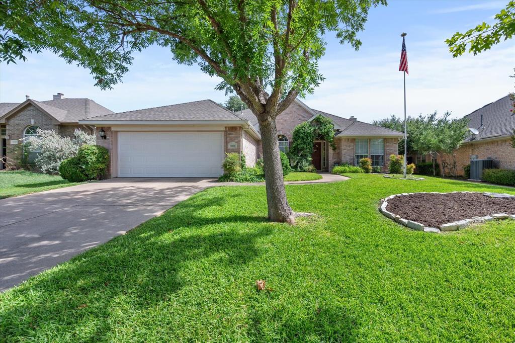 a view of a yard in front of a house