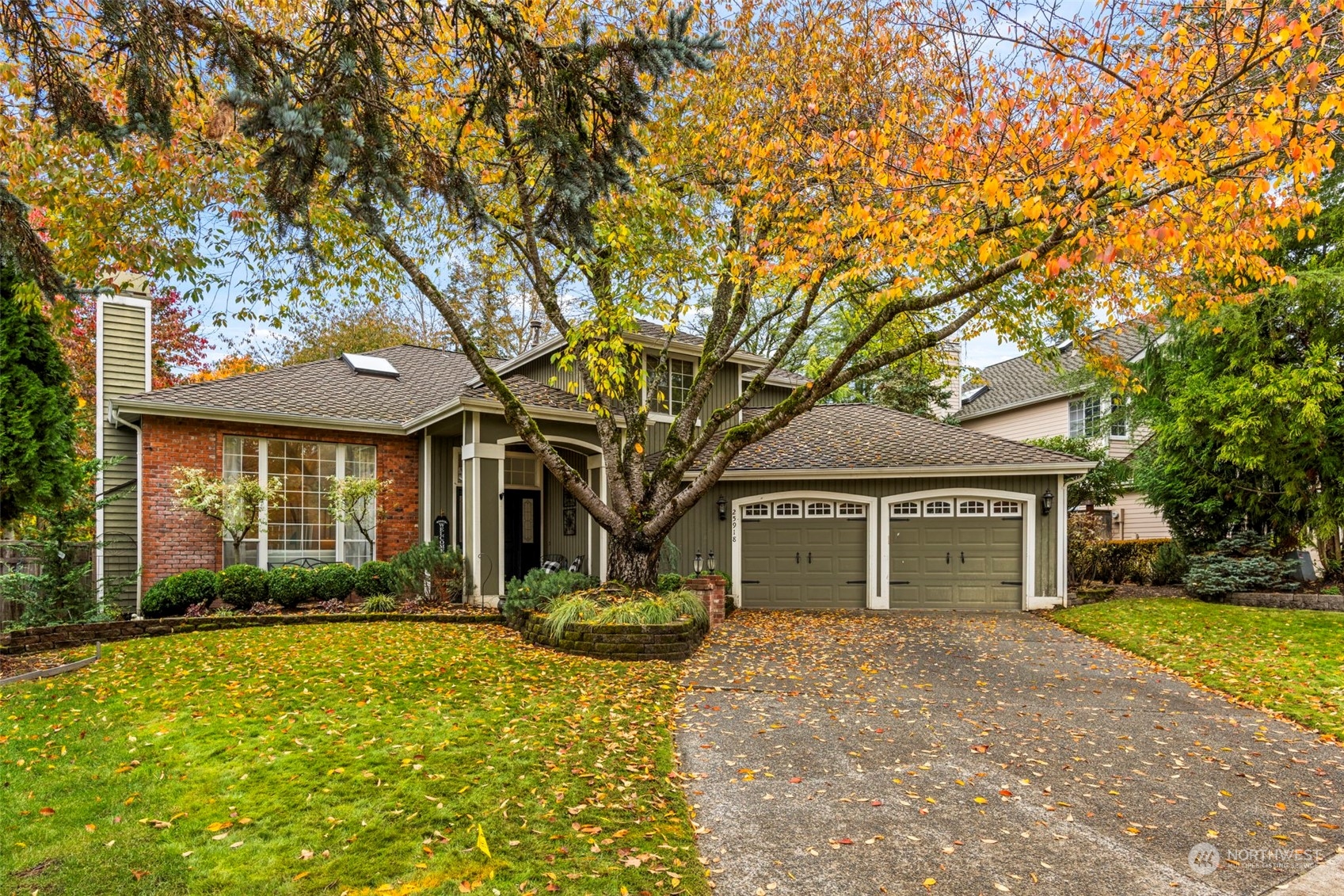 front view of a house with a yard