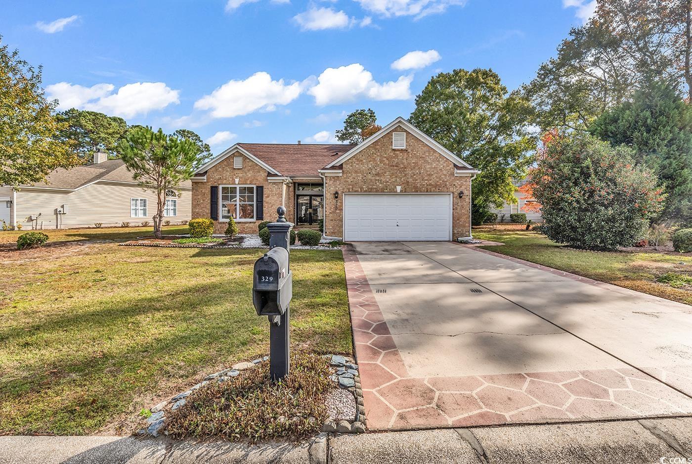 View of front of house featuring a front yard and