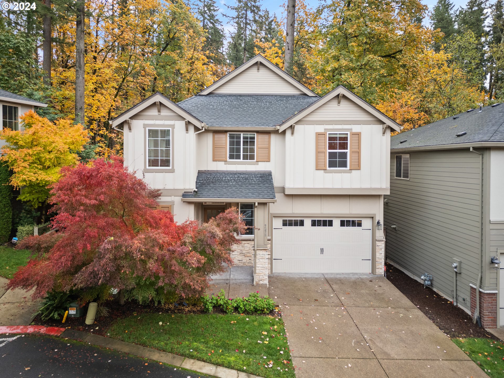 a view of front of house with a yard