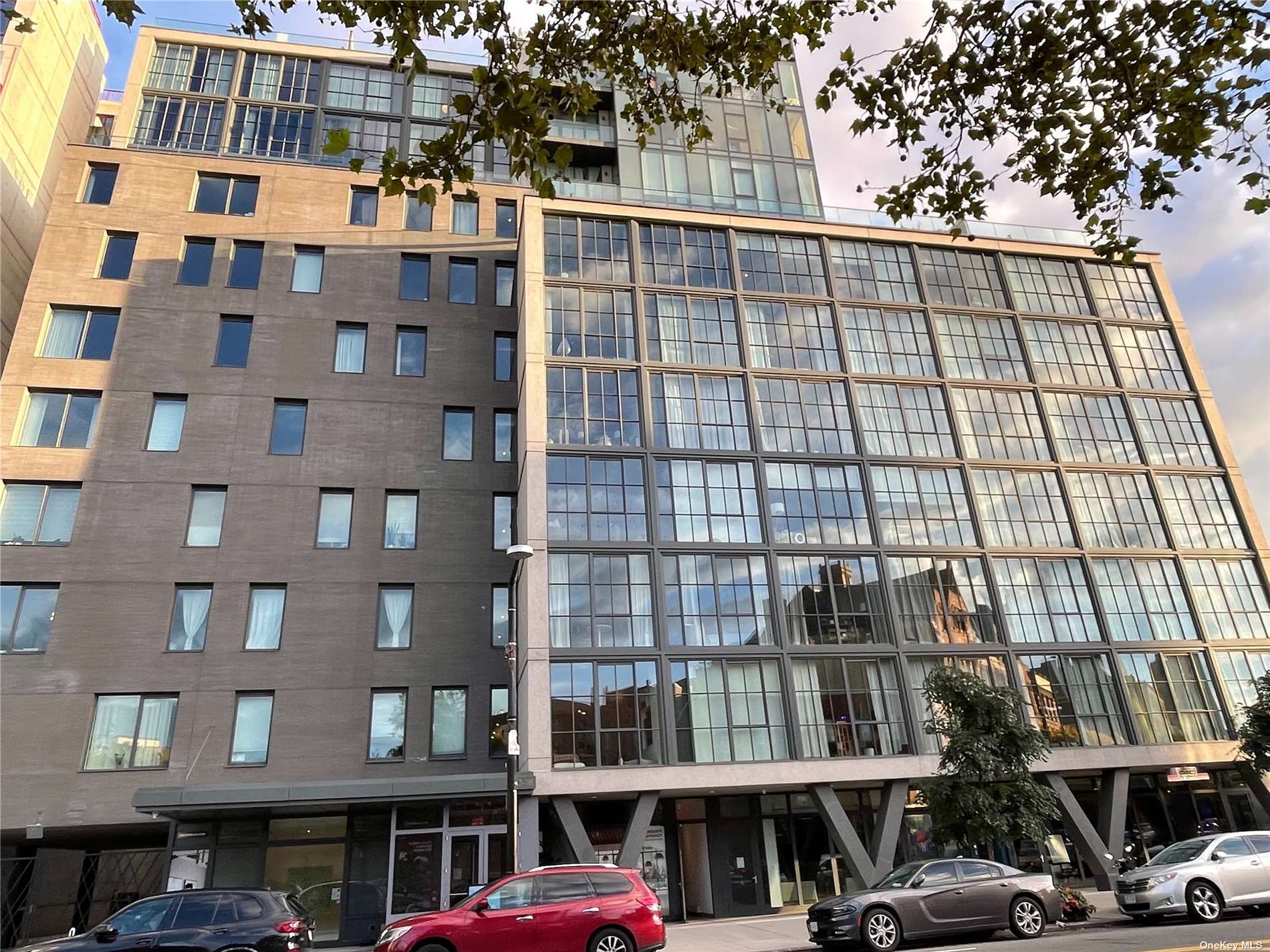 a front view of a building with glass windows