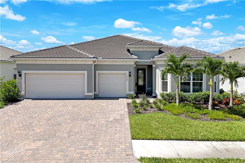 View of front of property with a garage