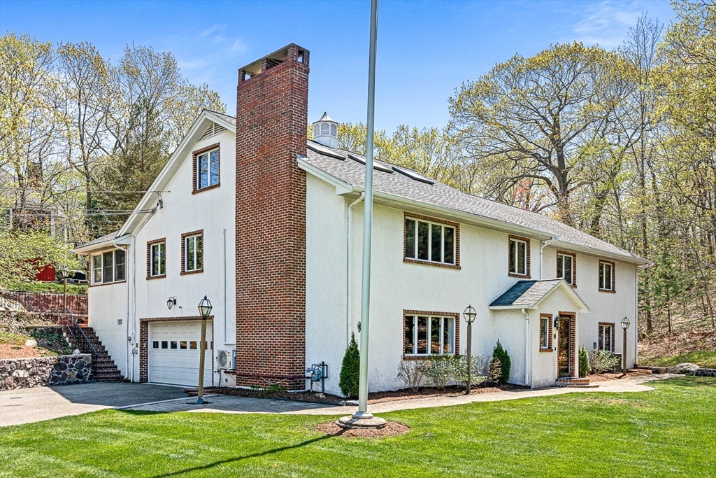 a front view of house with yard