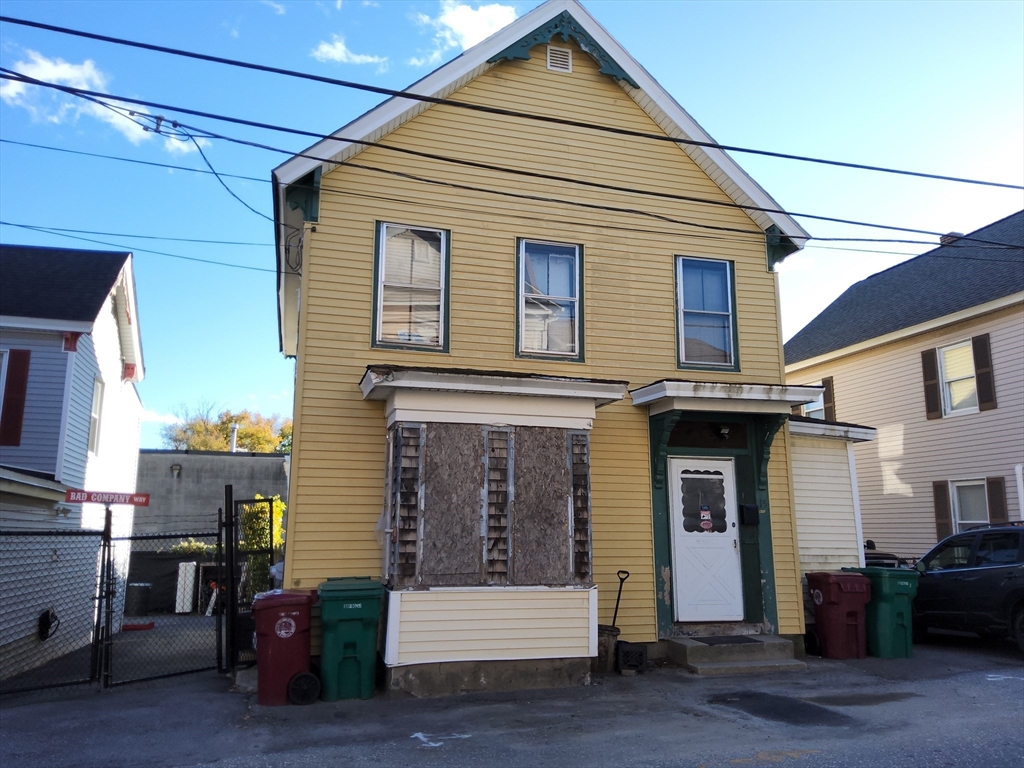 a front view of a house with a garage