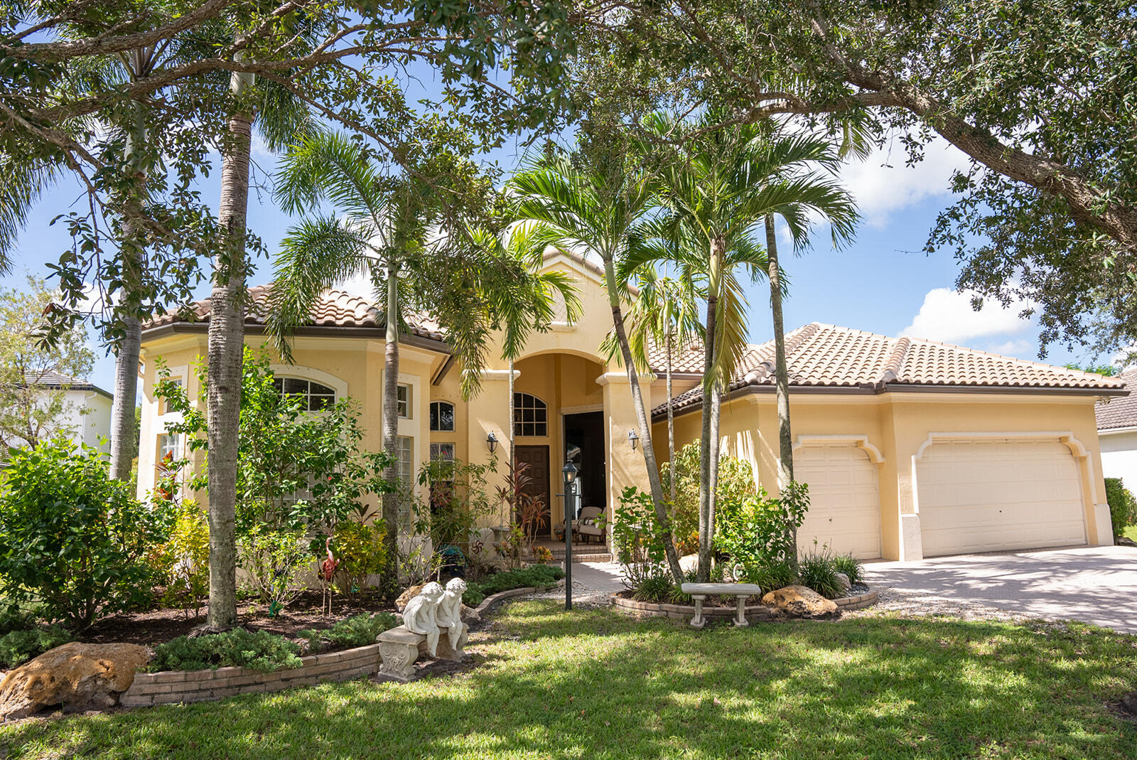 front view of a house with a yard