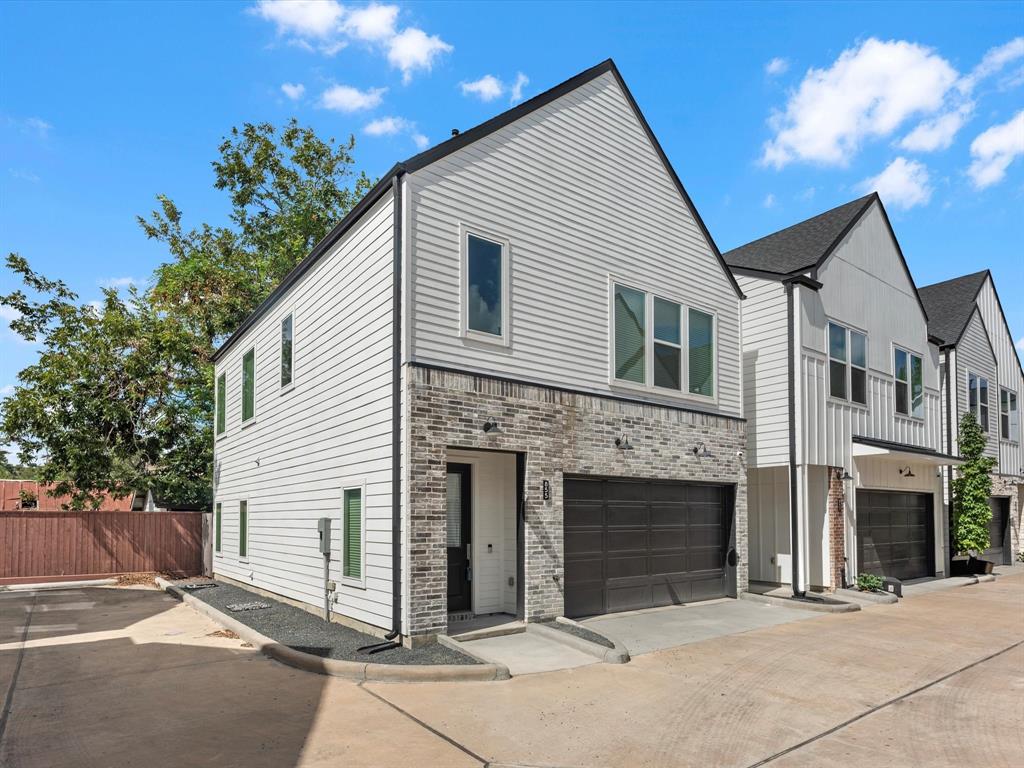 a view of a house with a garage