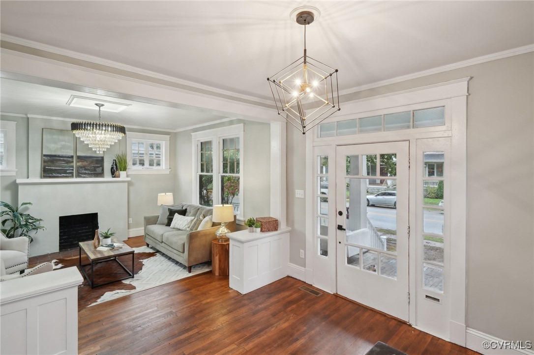 Entryway with dark hardwood / wood-style floors, c