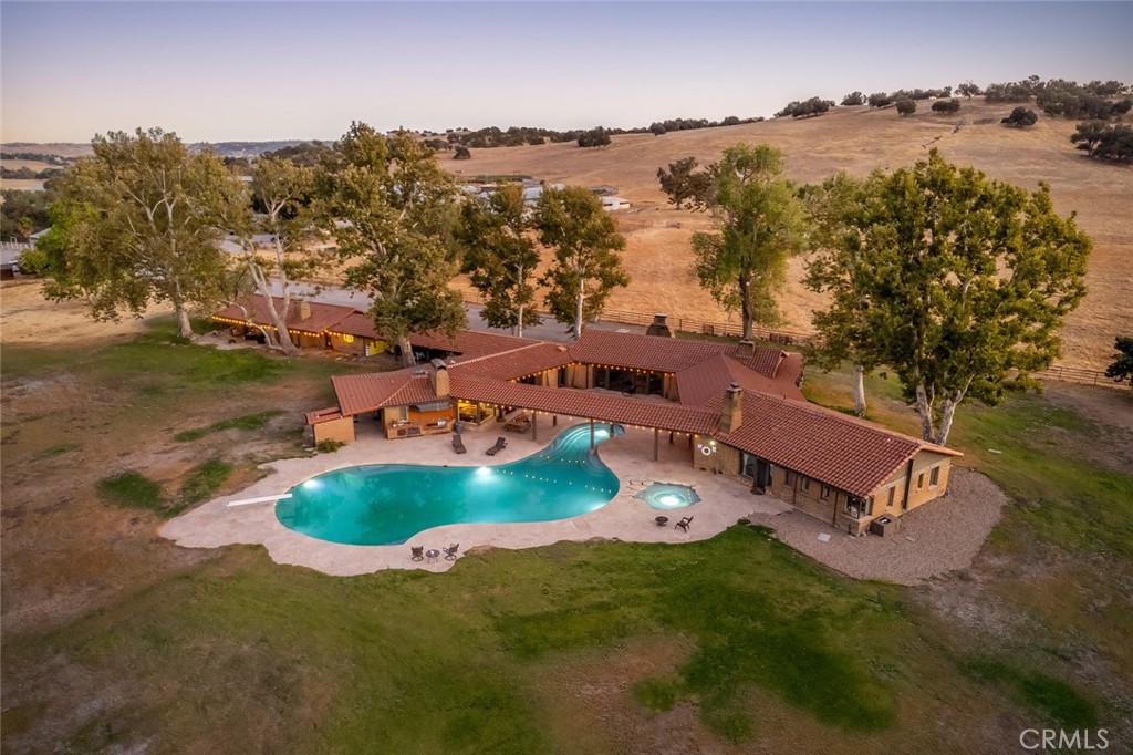 an aerial view of a house with garden space