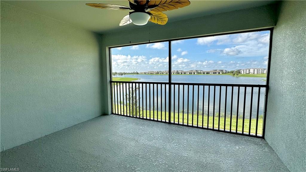 a view of a porch with a floor to ceiling window