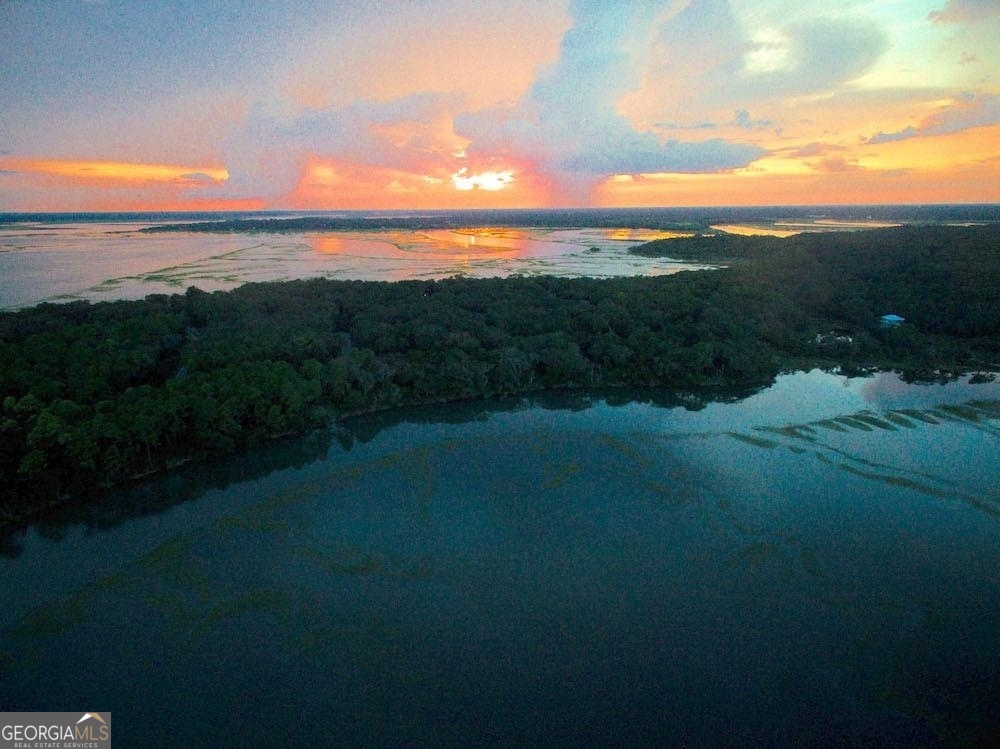 a view of a lake from a yard