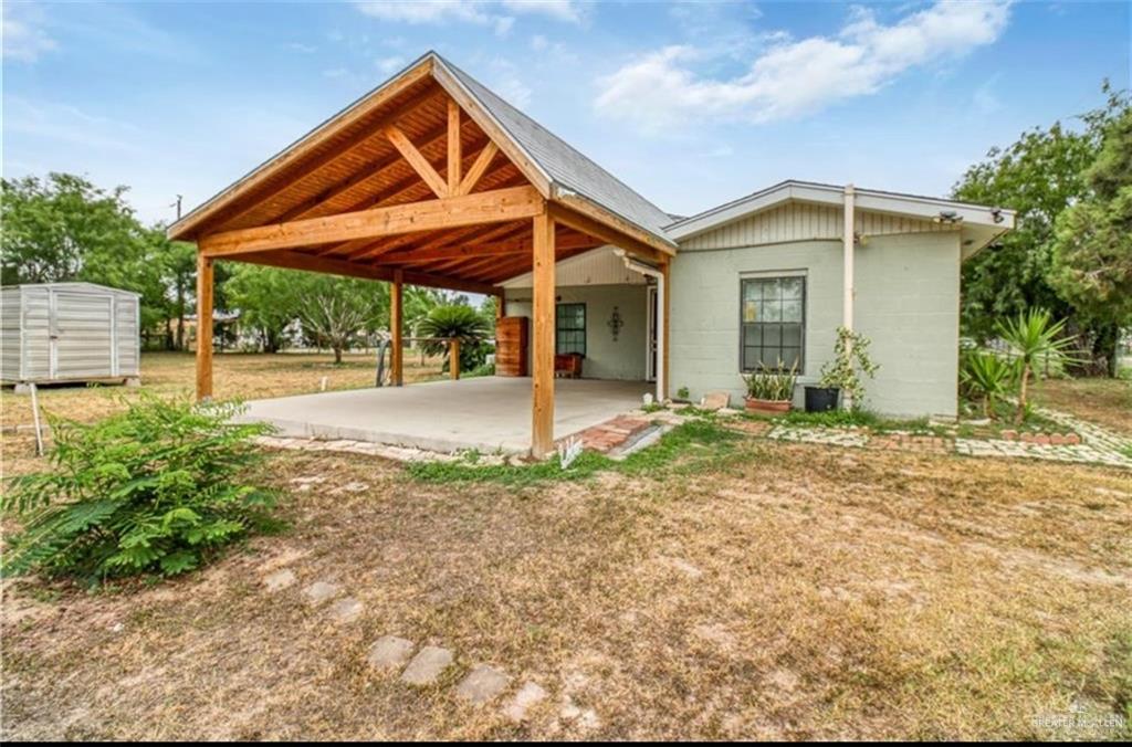 Entrance to the Property, the main door is thru the covered patio