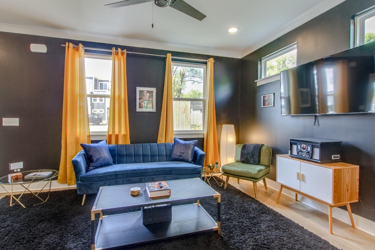 a living room with furniture and a window