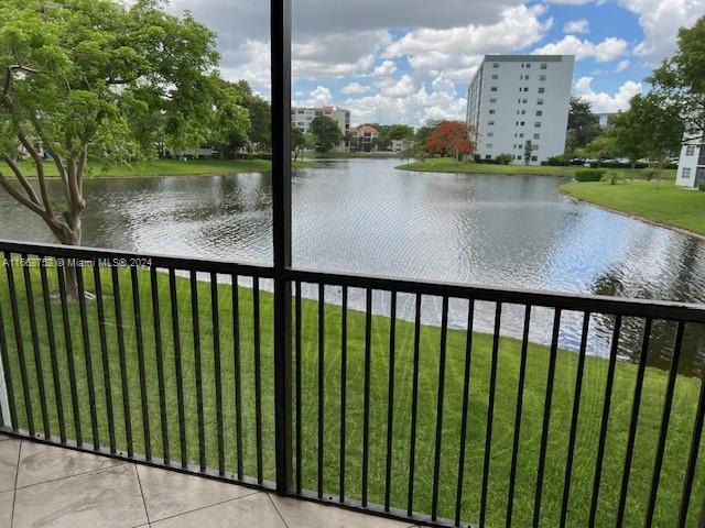 a view of swimming pool from a balcony