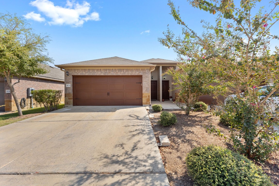 Side A - Garage & Driveway