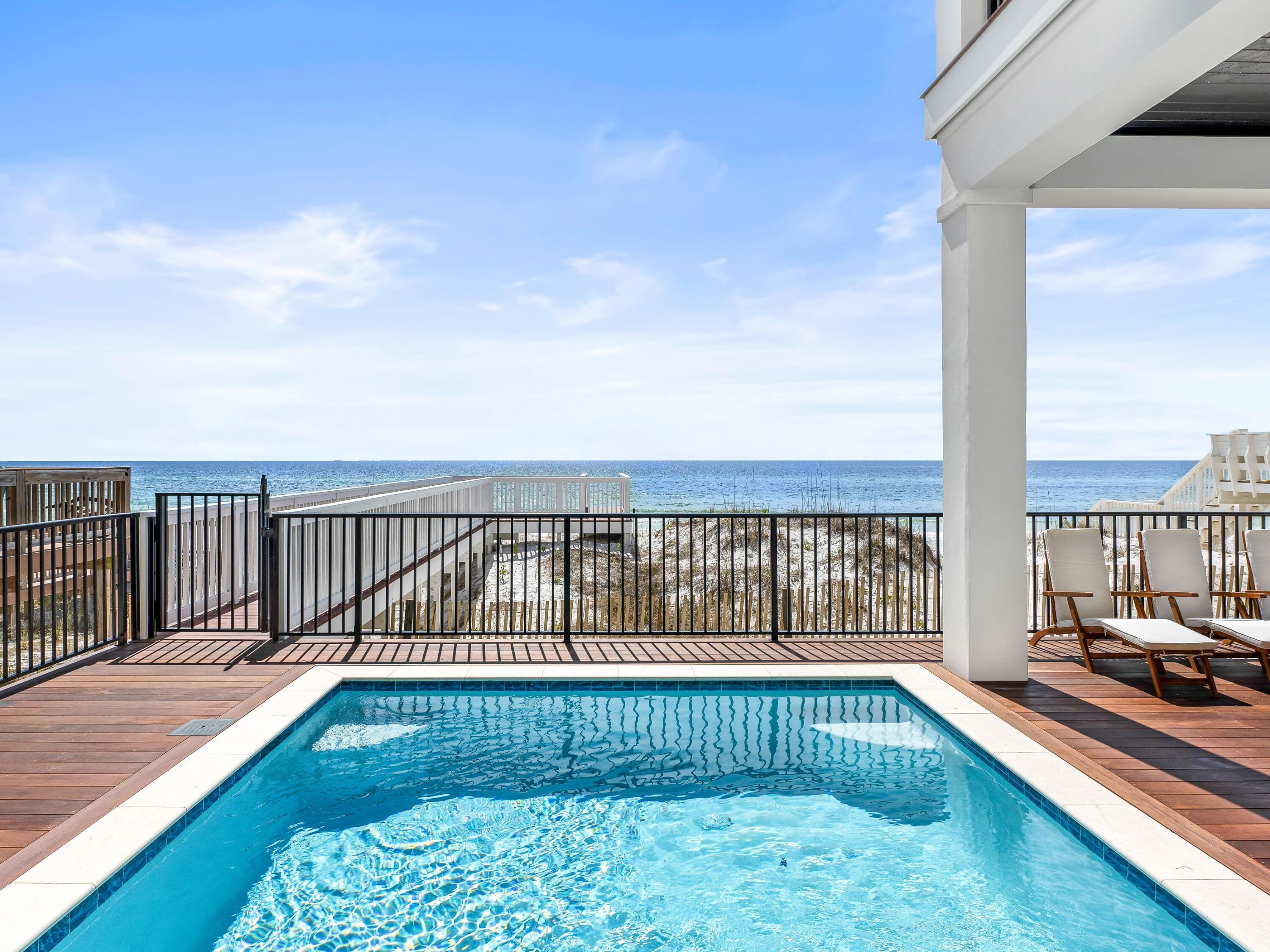 a view of balcony with wooden floor