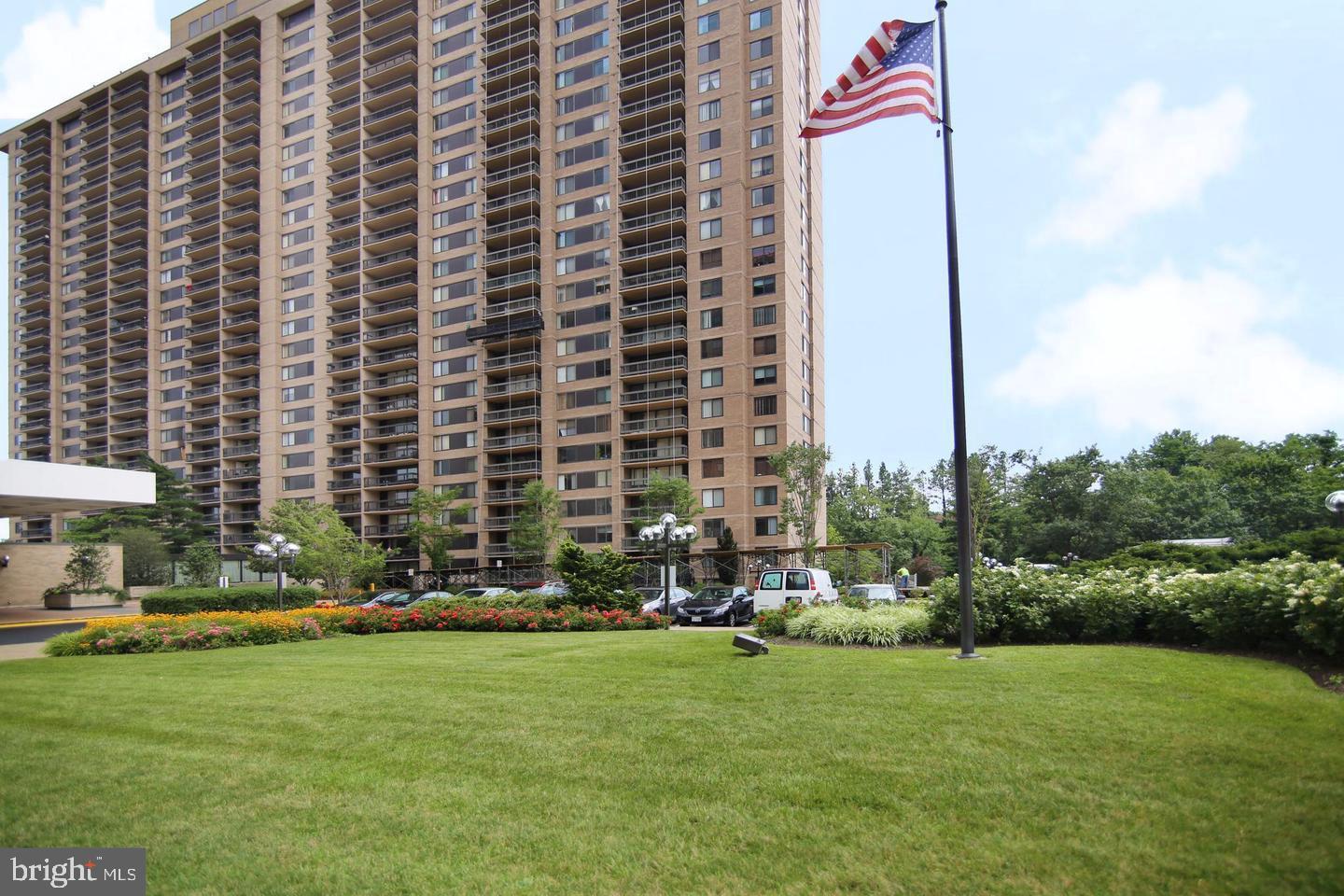 a front view of a building with garden