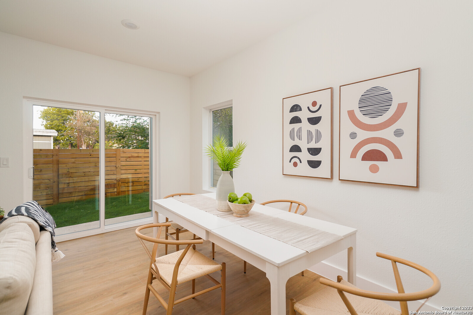 a view of a dining room with furniture window and outside view