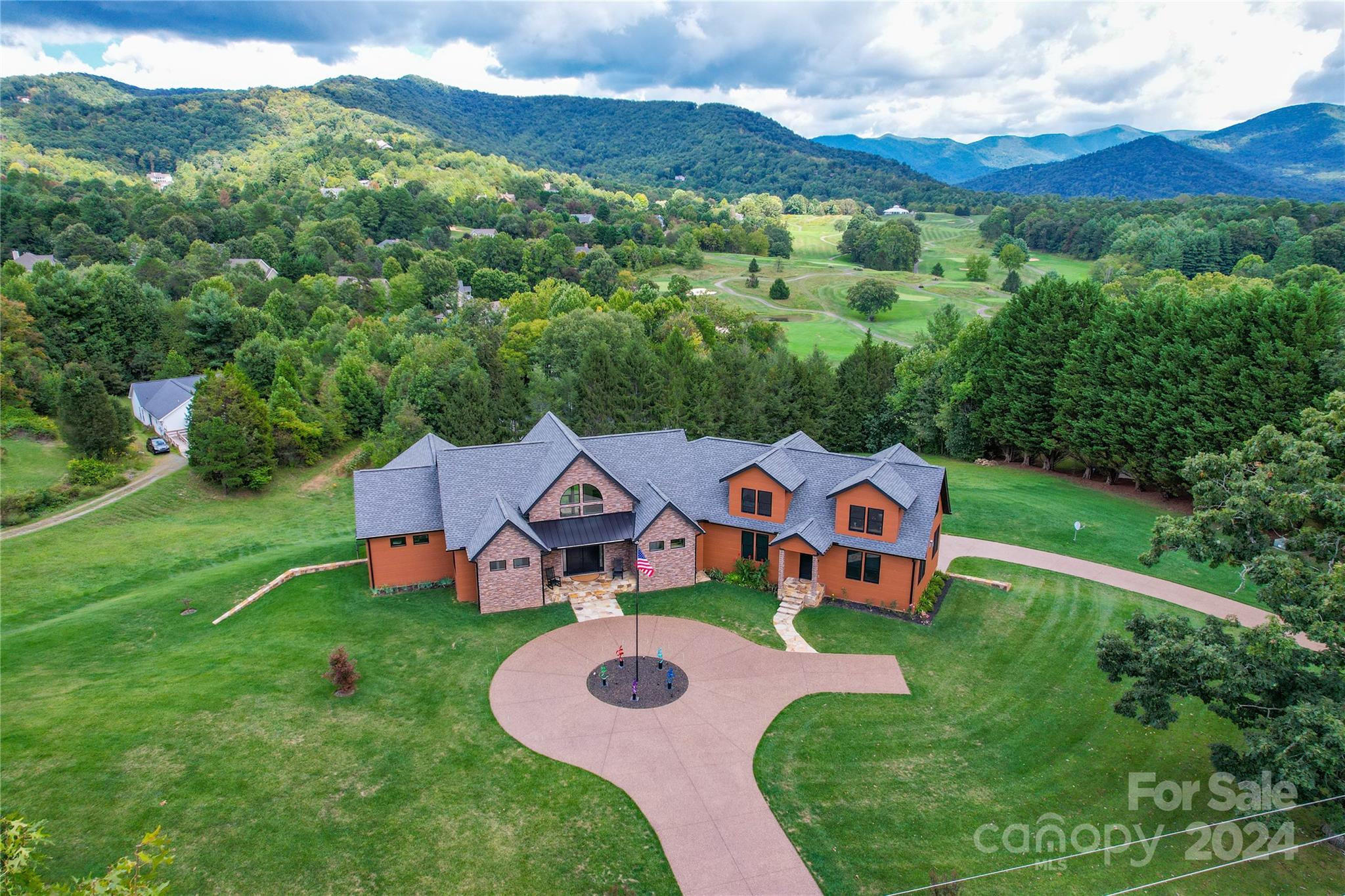 a view of a house with a big yard