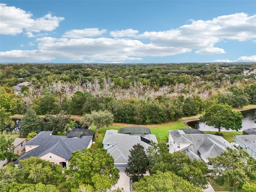 an aerial view of a house with a garden