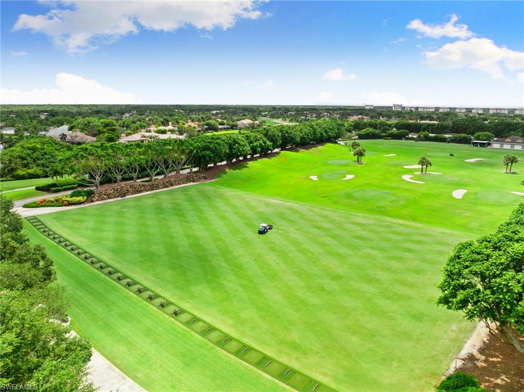 a view of a golf course with a lake