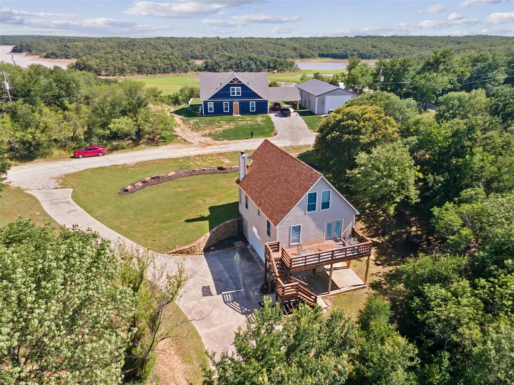 an aerial view of a house with a garden