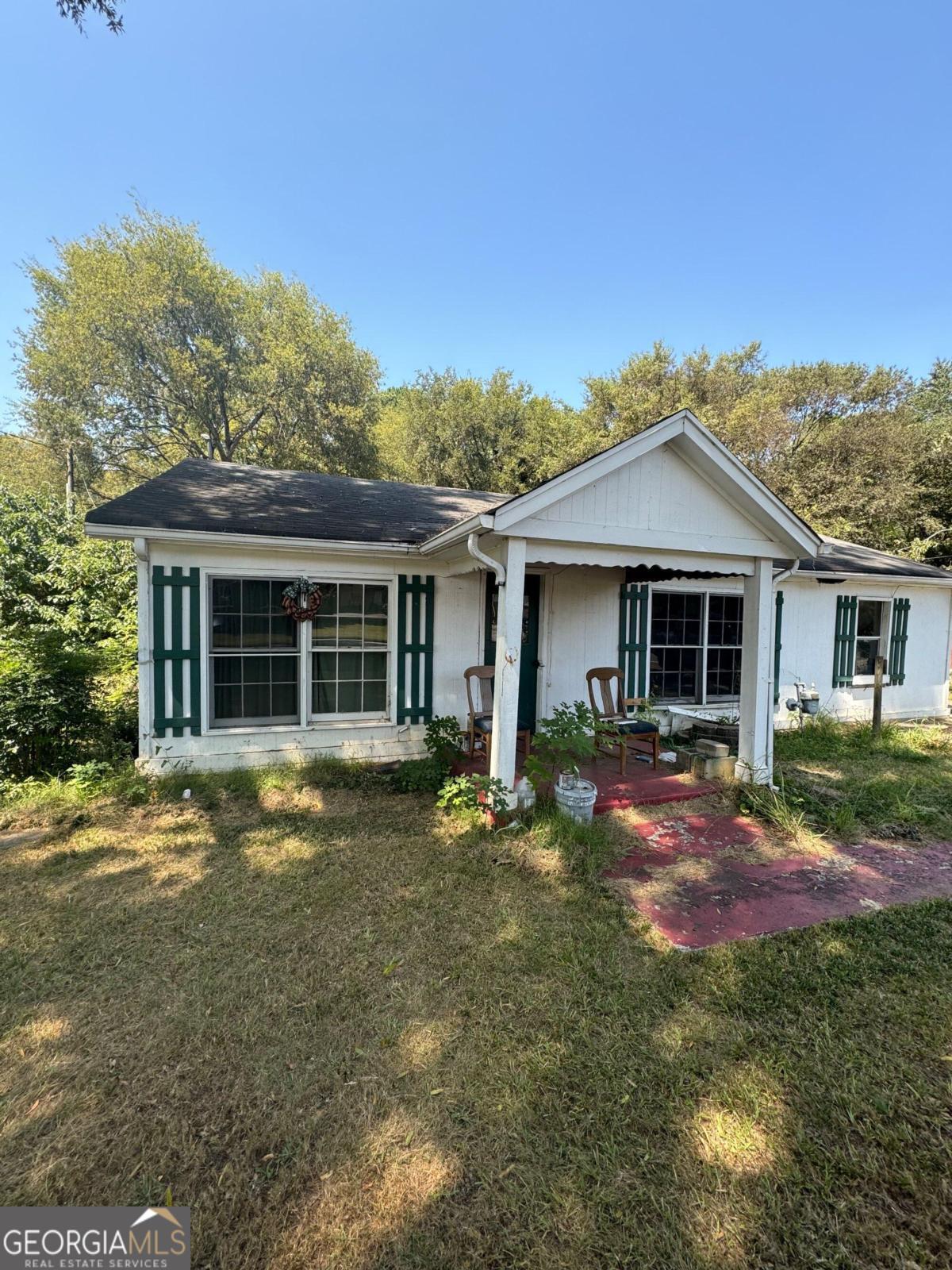 front view of a house with a yard