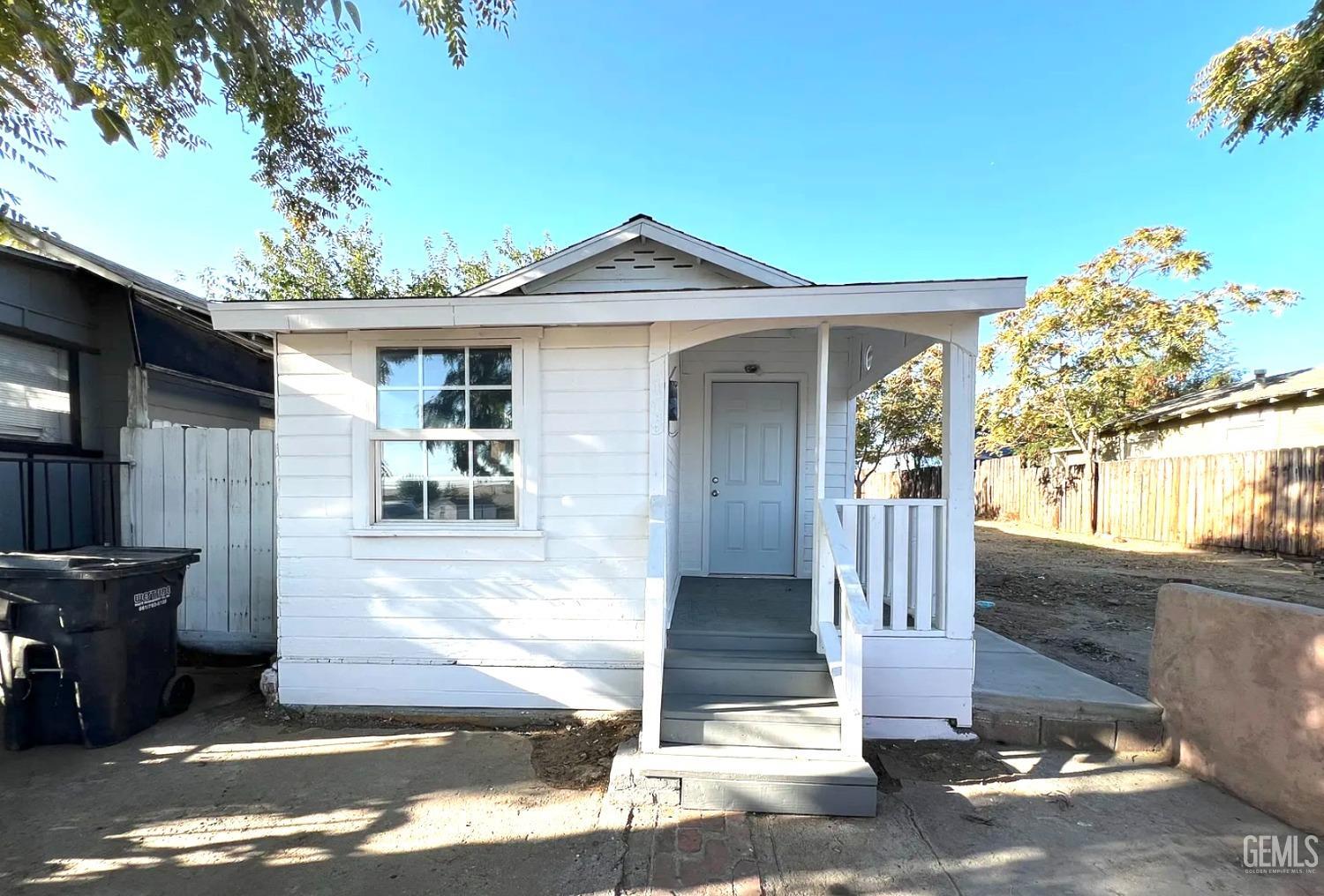 a front view of a house with a porch