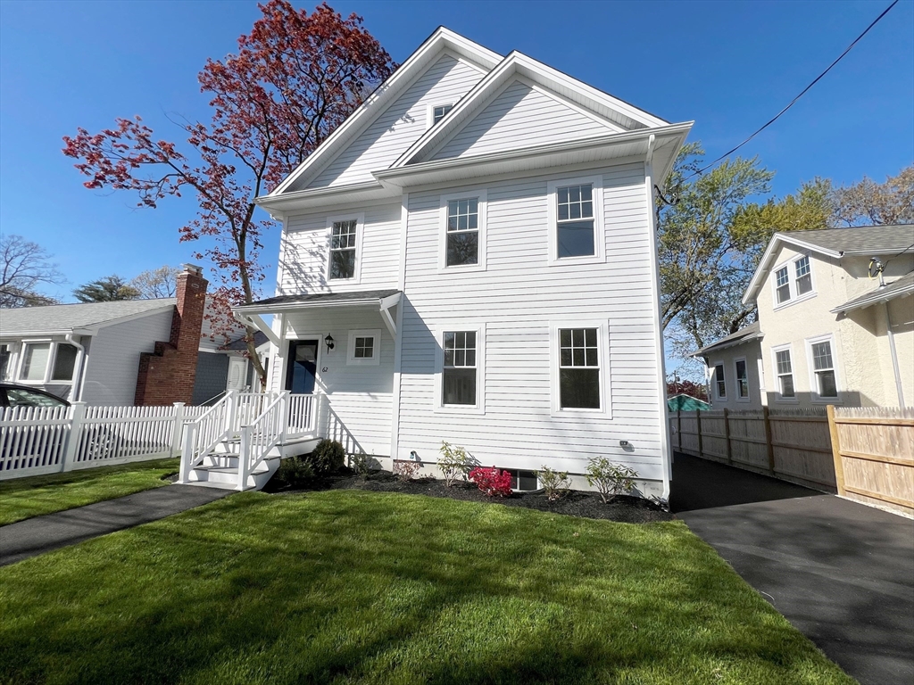 a front view of house with yard