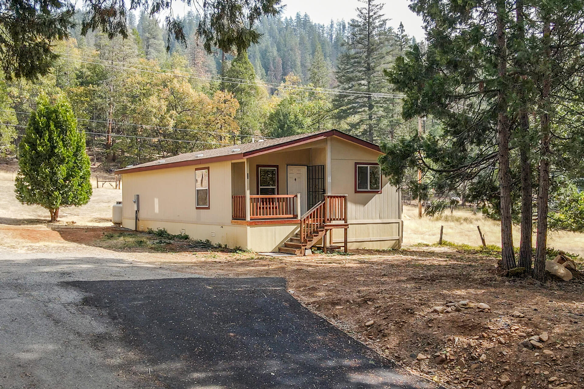 a view of a house with a yard