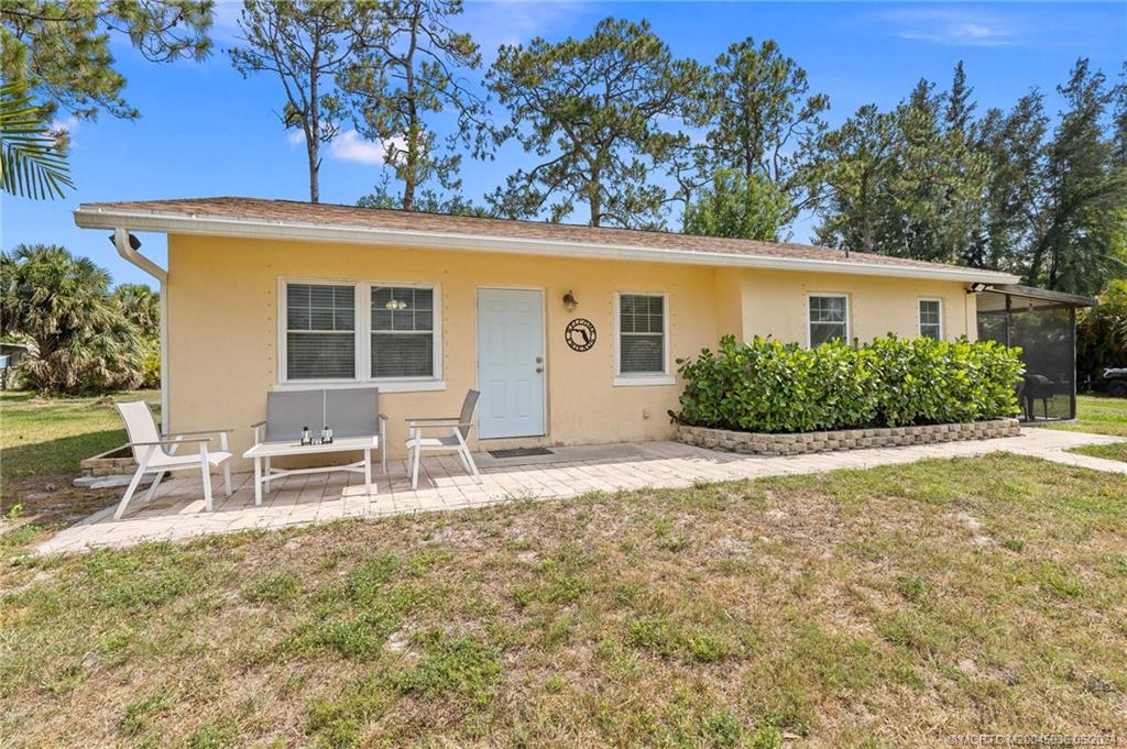 front view of a house with a patio