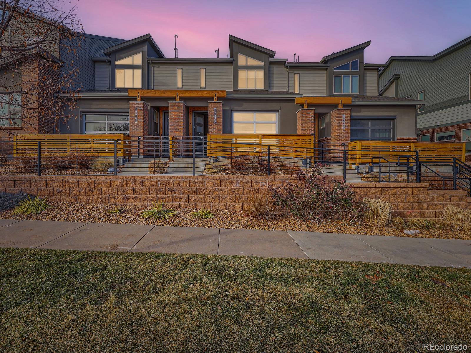 front view of a house with an yard