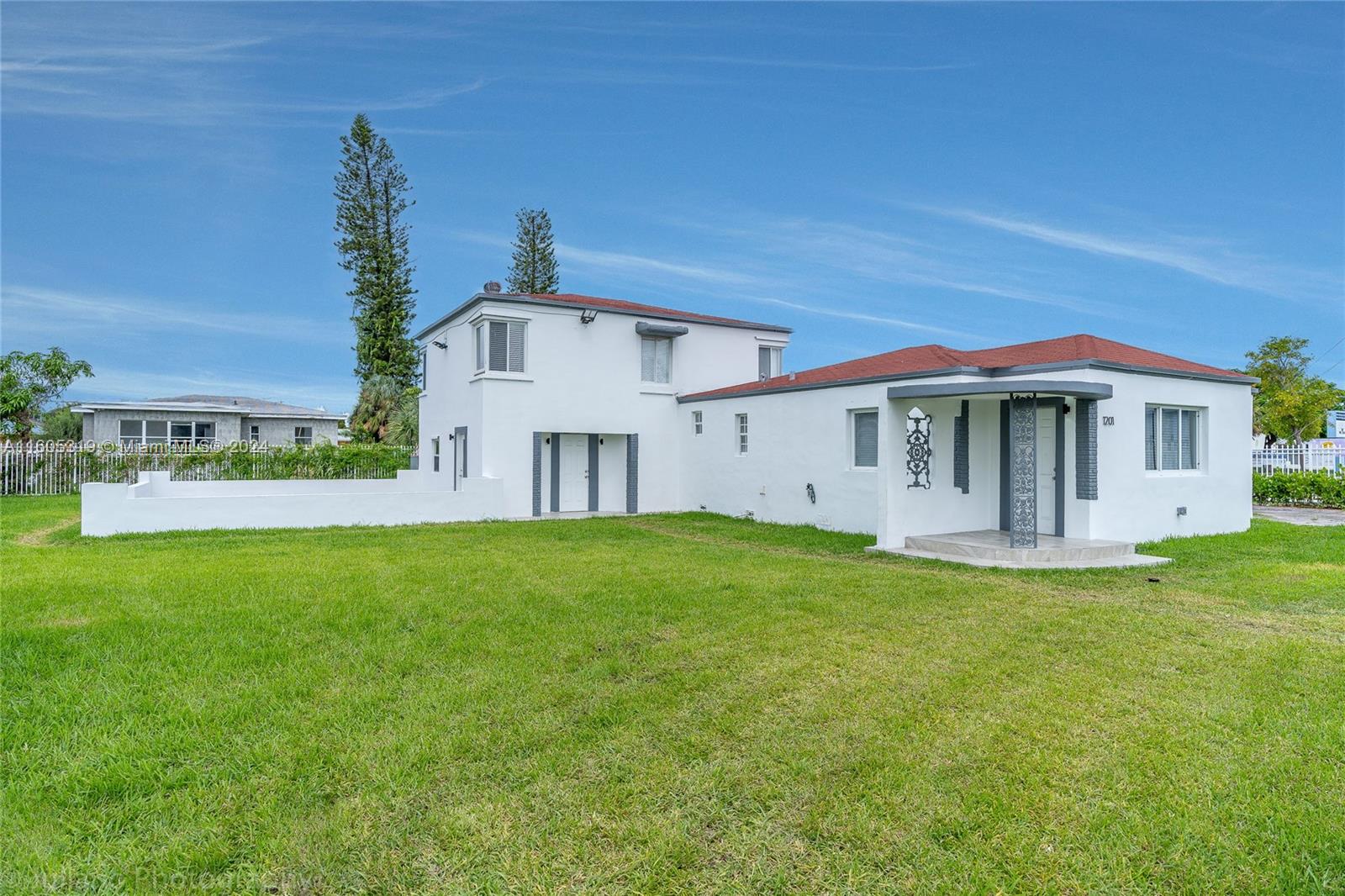 a view of a house with a big yard