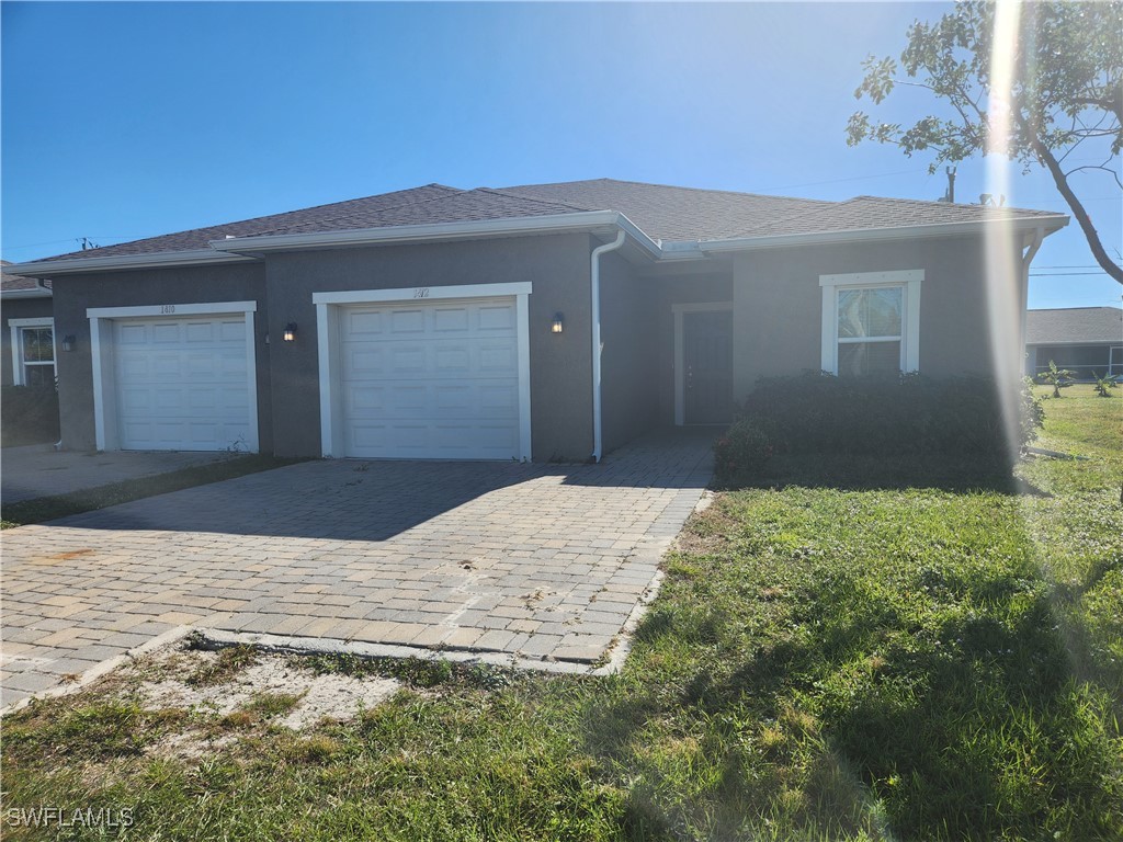 a house with yard in front of it