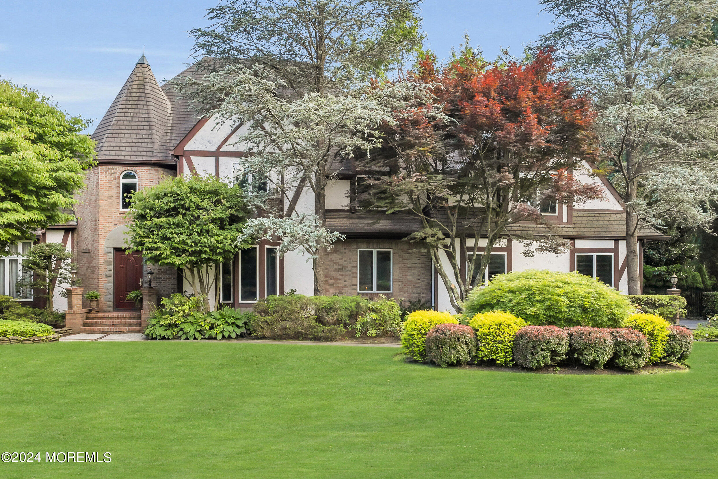 a view of a house with a garden