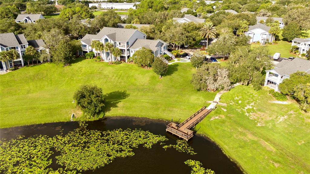 a view of a lake with a yard