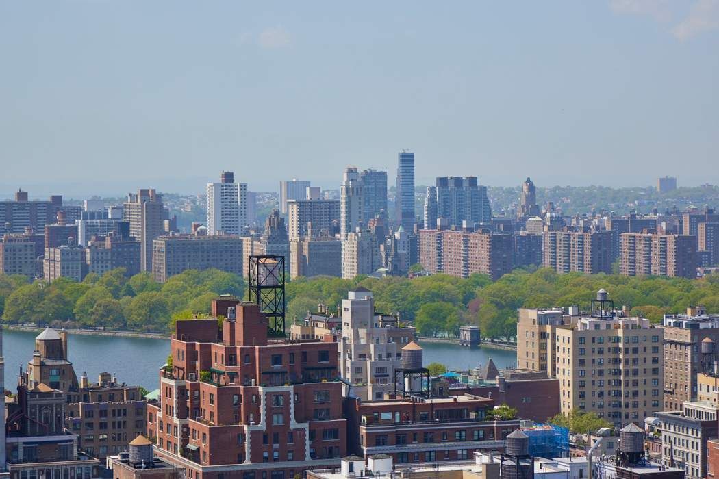 a view of a city with tall buildings