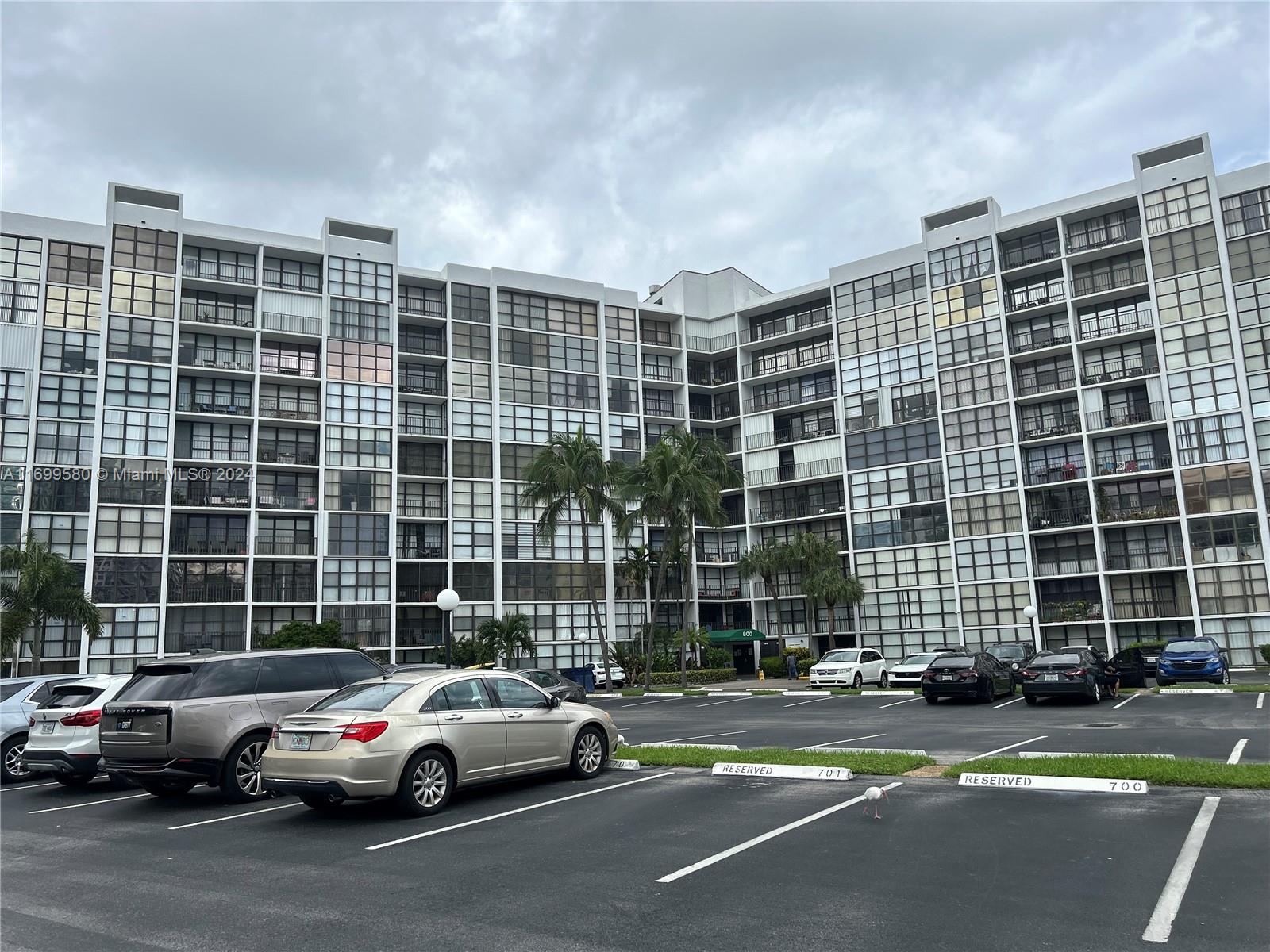 a cars parked in front of a building