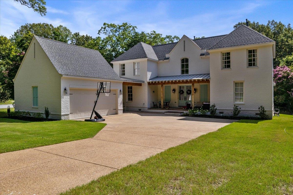 front view of house with a yard