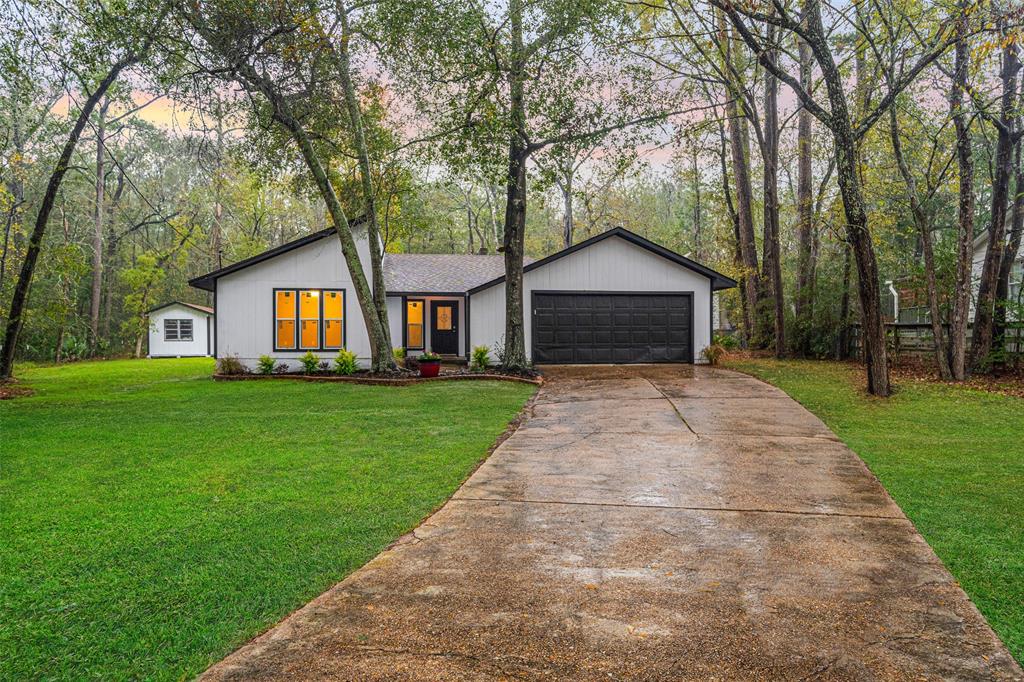 a front view of a house with yard