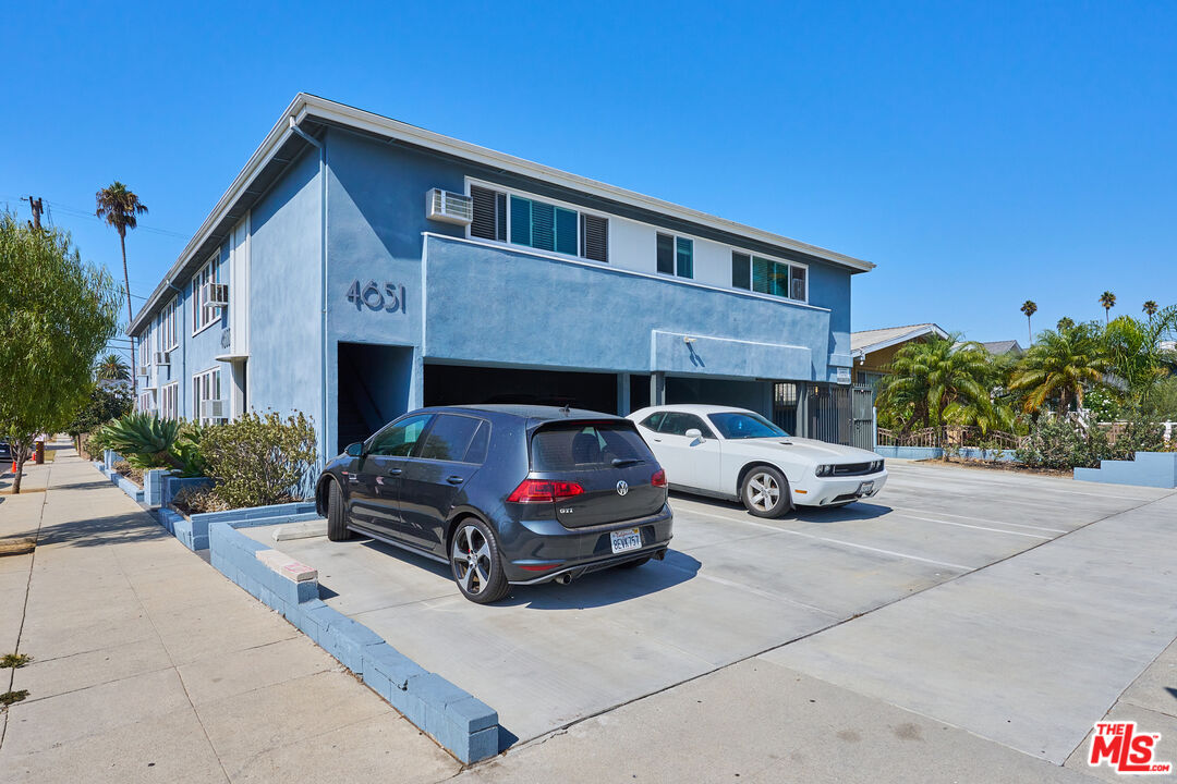 a car parked in front of a house