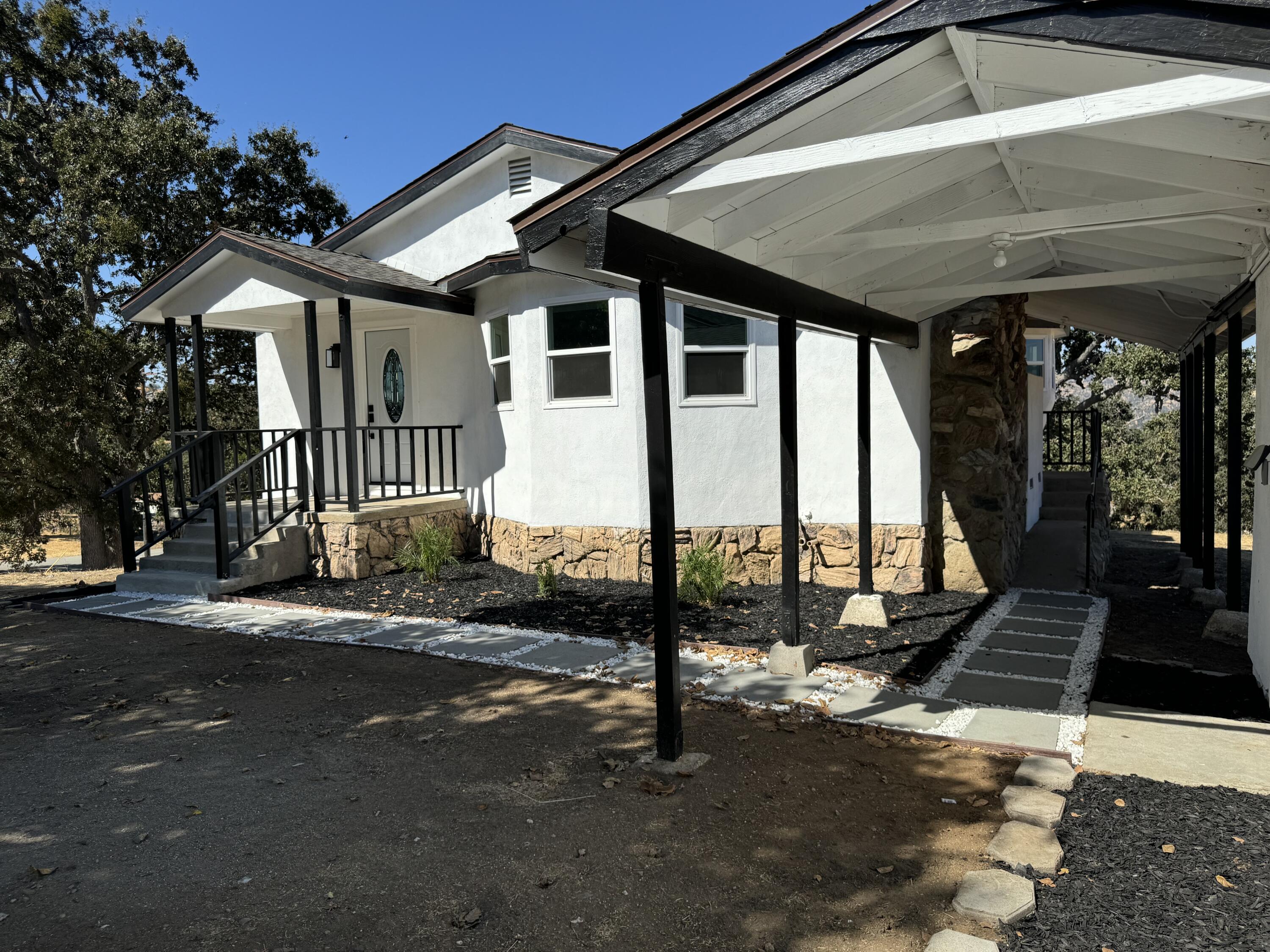 a view of a house with a porch